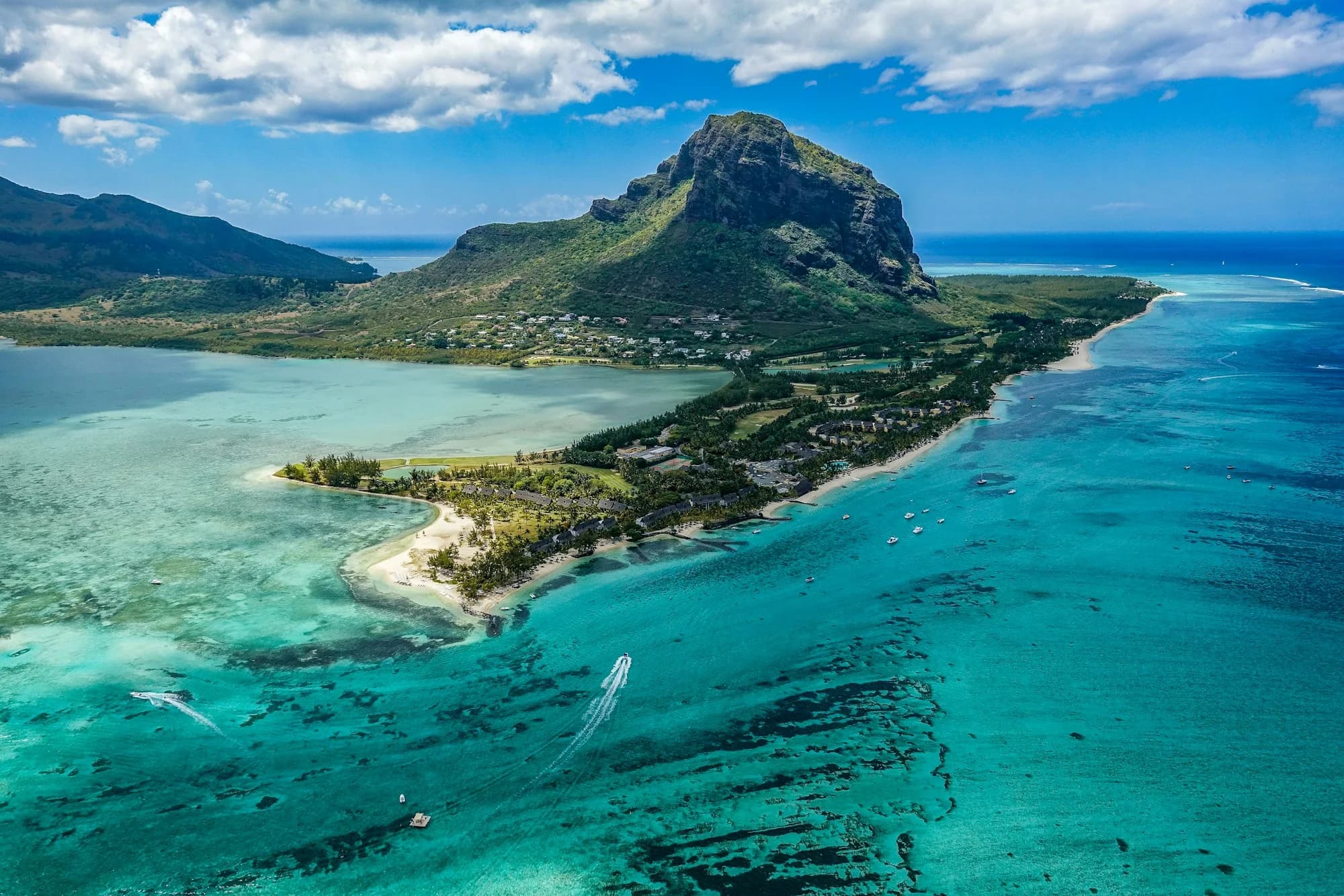 Aerial view of Le Morne peninsula and its turquoise lagoon in Mauritius